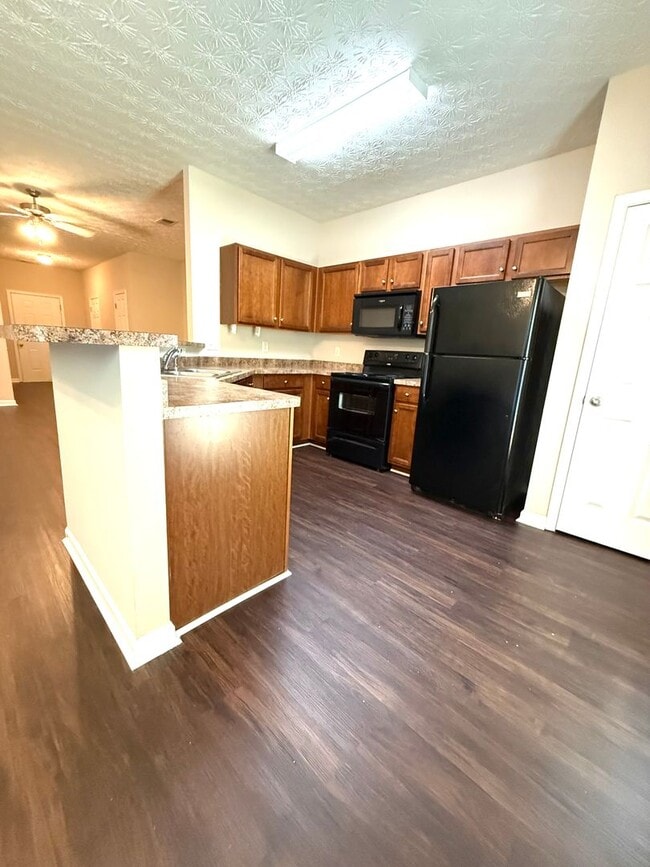Building Photo - Welcome to this charming 3 bedroom, 2.5 ba...