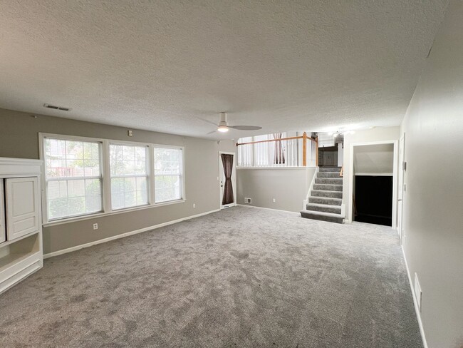 Building Photo - SEE IT NOW: Spacious 3-Bedroom Smart Home ...