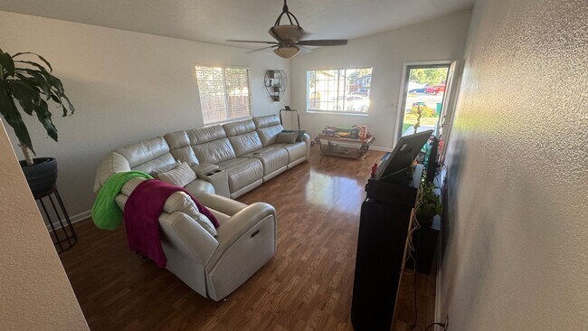 Building Photo - 4bed/2bath/2car garage. RV parking & massive landscaped backyard in cut-de-sac