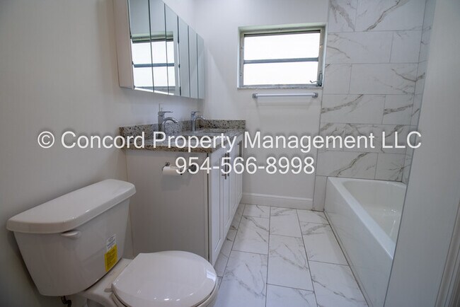 Building Photo - Updated 2 BR- Open Layout- Island Kitchen-Pool- Central AC