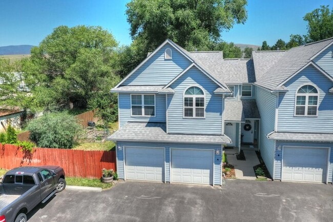 Primary Photo - Townhouse with a private yard