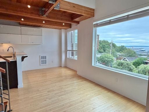 Building Photo - Industrial-Style Queen Anne Townhome with water views on every floor! AVAILABLE NOW!