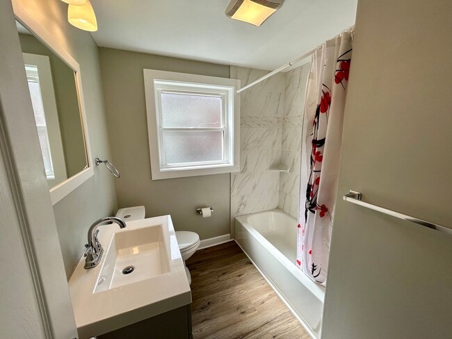 Building Photo - DELHI TWP- Spacious 4 bedroom 3 bath Cape Cod with garage