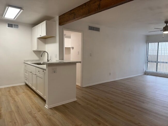 Building Photo - NOW OFFERING $400 OFF MOVE-IN COSTS Utilities Included – First Floor – In-Unit Washer/Dryer
