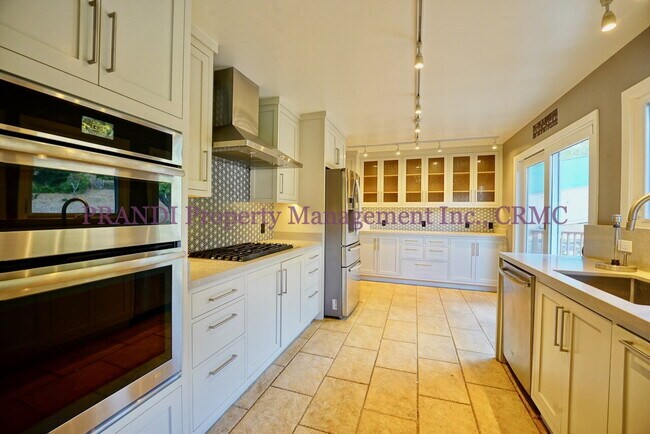 Building Photo - Bright and Inviting 4BR Home Minutes from ...