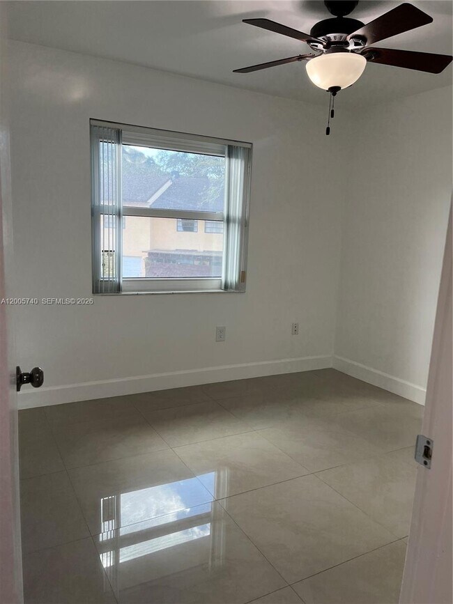 Building Photo - 6661 SW 137th Ct