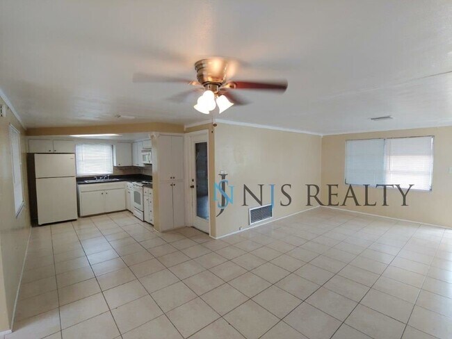 Building Photo - Beautiful 2/2/1 1150 Sq. Ft. with BONUS ROOM!!... tile & luxury plank flooring, Frest paint and a...