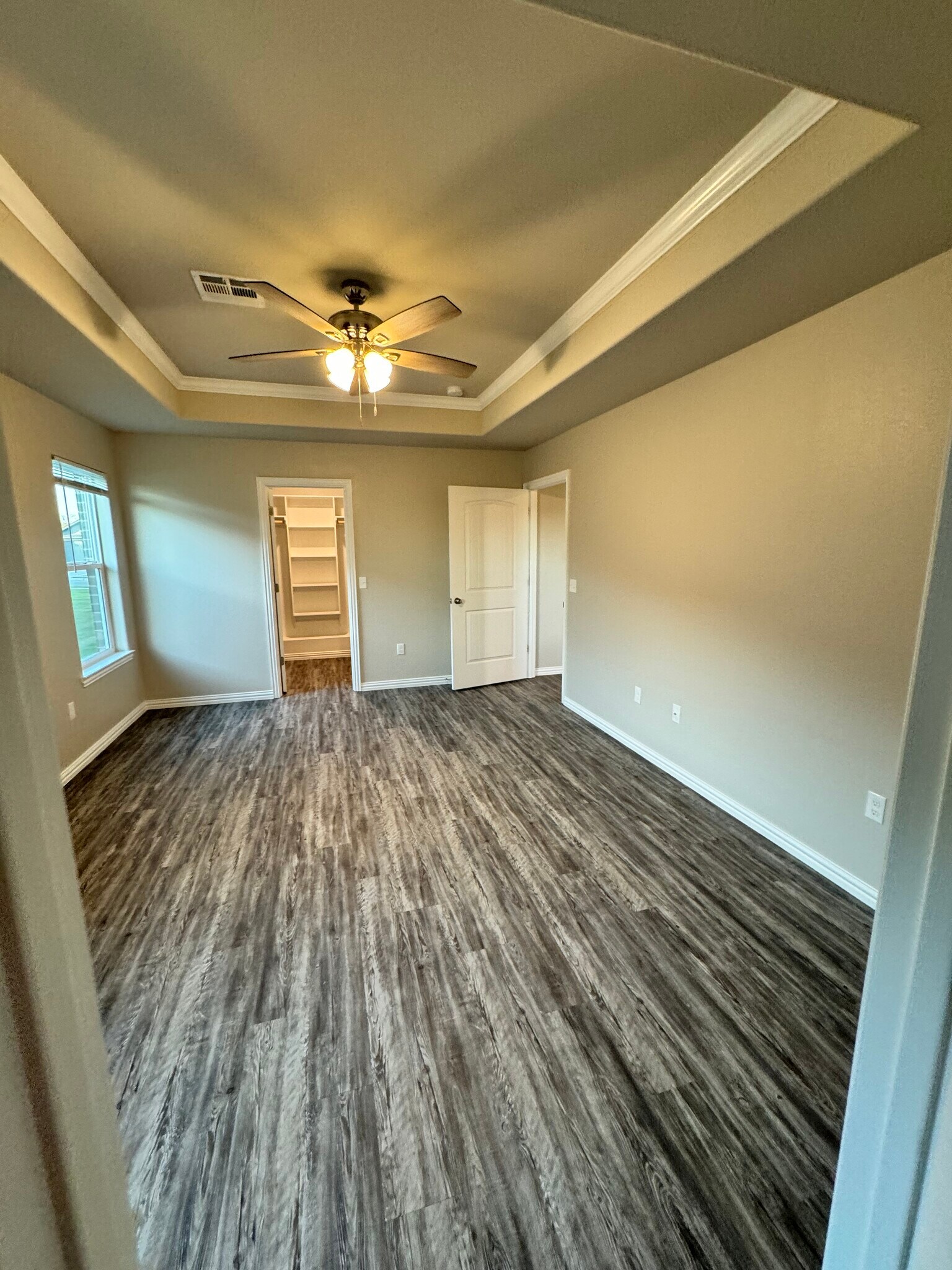Main bedroom - view into closet - 3609 Gallant Fox Ave