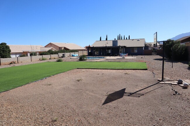 Building Photo - Home With A Pool and Much More!