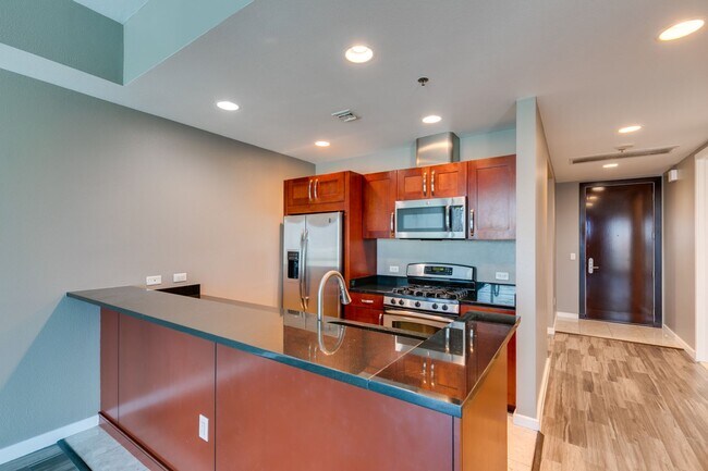 Building Photo - Iconic Strip-View Luxury | Elegant 1BR + Den High-Rise Residence