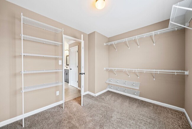 Building Photo - Four Bedroom with Three Car Garage!