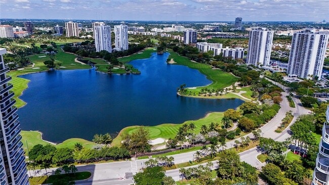 Building Photo - 20191 E Country Club Dr