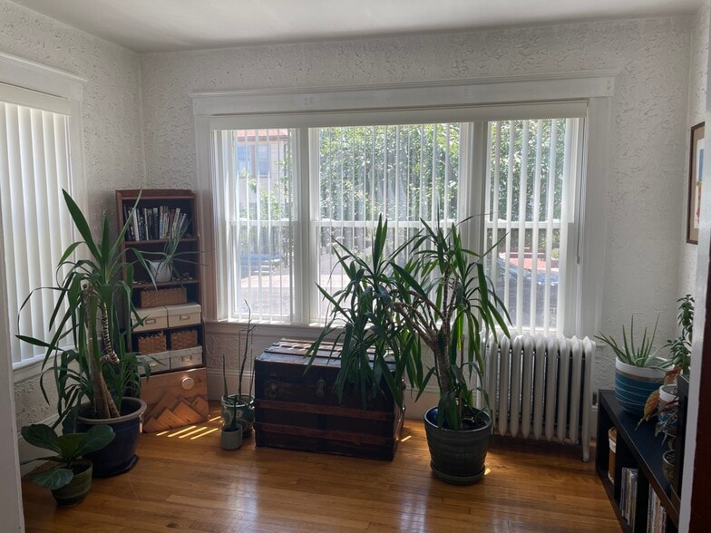 Front of house "sunroom" is through the french doors - 92 Harnden Ave