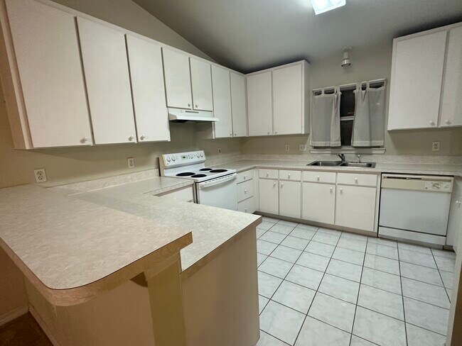 Kitchen with side bar or eat in kitchen - 1013 SW 75th Way