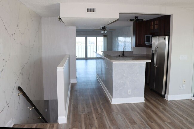 Building Photo - Luxurious Two-Story Condo with Breathtakin...