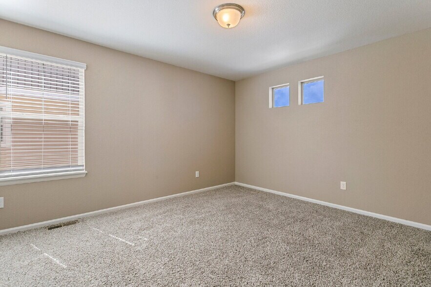Building Photo - Spacious Banning Lewis Home with Finished ...