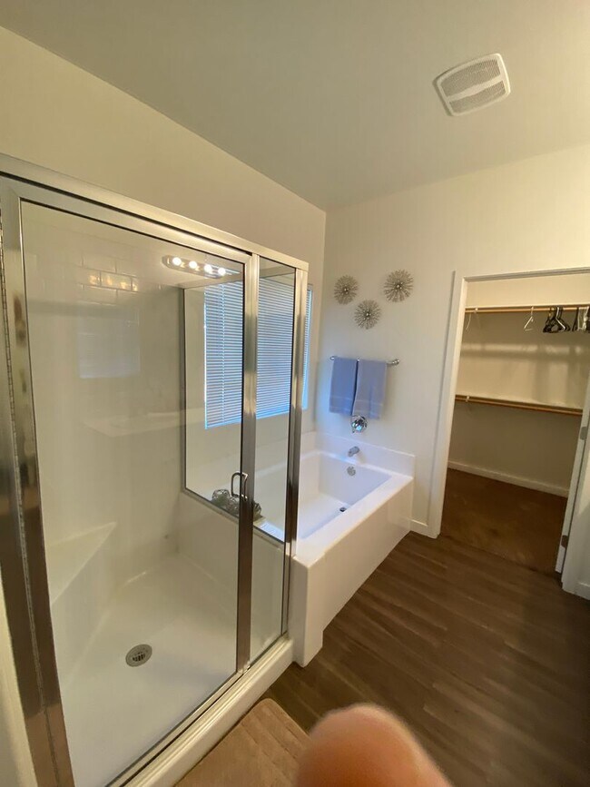 Building Photo - Welcome to the Best Deal in Town. Fully furnished 4 BD 2 BA house on a corner lot