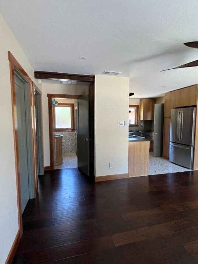 Building Photo - Artisan-Built Custom Cottage Retreat | Private Yard, Garage & EV Charging Ready