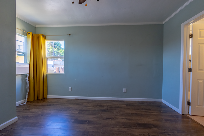 Bedroom 3 (Primary) - w/Midea brand new window AC unit & ceiling fan - 6401 Arlington Ave