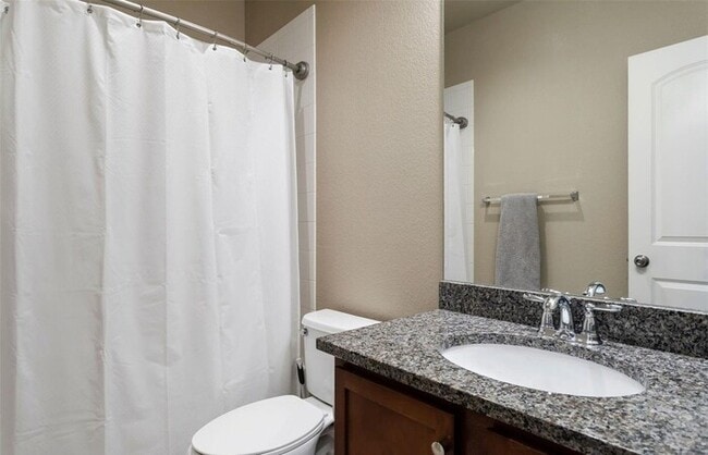 Building Photo - Modern 3BR Home with Finished Basement & Private Courtyard in Lowry