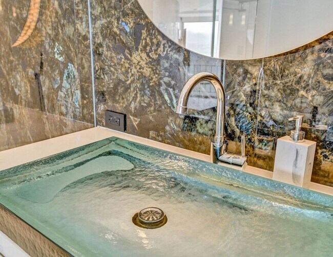 Building Photo - Designer Luxury. Iconic Views. Extraordinary Living.
