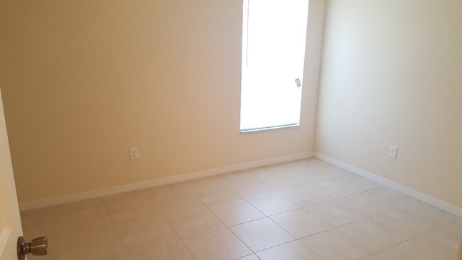 Building Photo - NEWER 3 bedroom 2 bath 1 car garage duplex in SW Cape!!  Lawn Care Included~