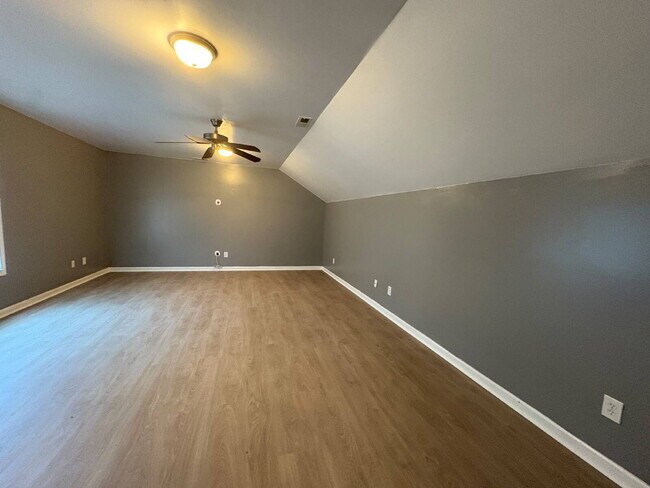 Building Photo - Spacious 4-Bedroom Sanctuary with Cozy Fireplace on Chimney Swift Drive!