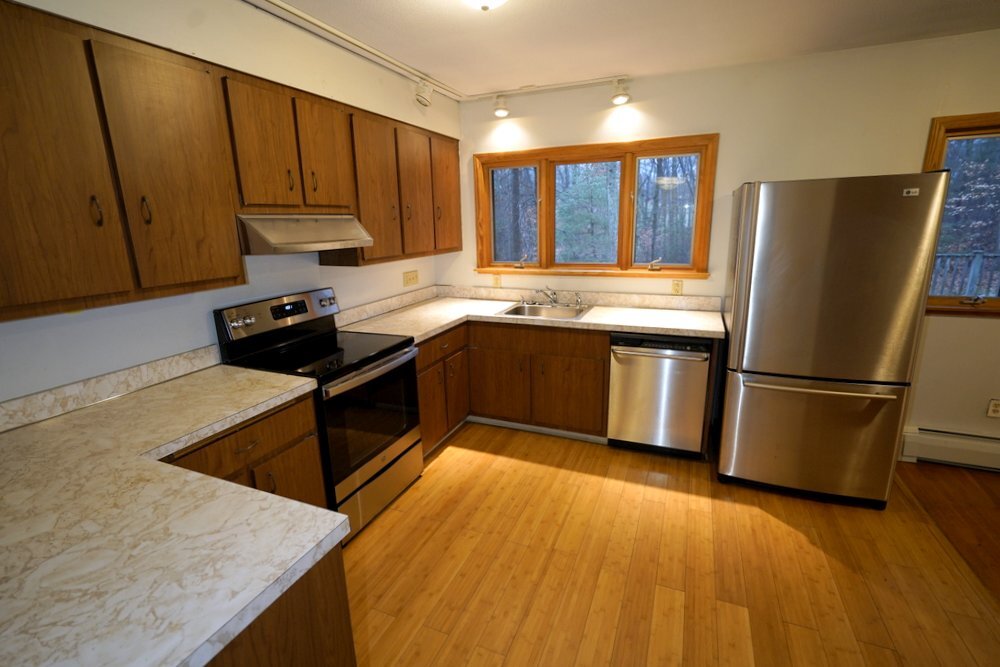 Kitchen with stainless steel appliances - 208 Grove St