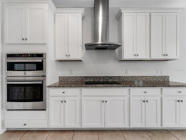 Building Photo - 7323 Pool Compass Loop