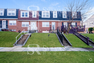 Building Photo - Welcome to this charming abode.