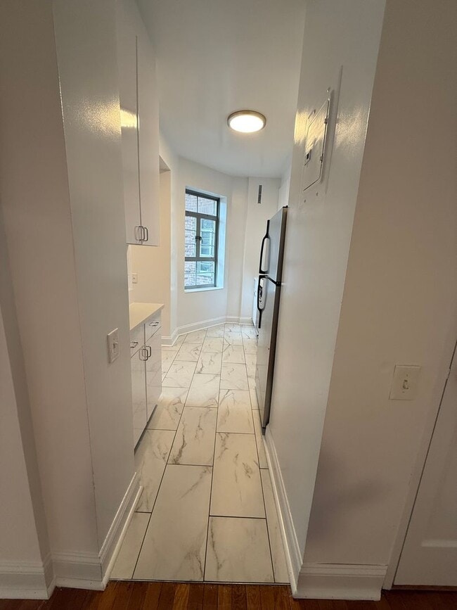 Building Photo - The Leslie — A Private Garden Enclave for ...