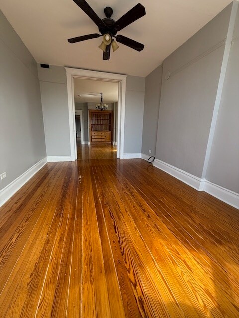 Living room facing dinning room with large pocket doors - 2138 W 21st Pl