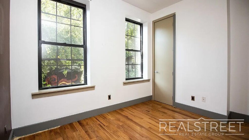 Building Photo - Gut-Renovated 3BR + Massive Finished Basement | Backyard, Laundry & HVAC | Bushwick