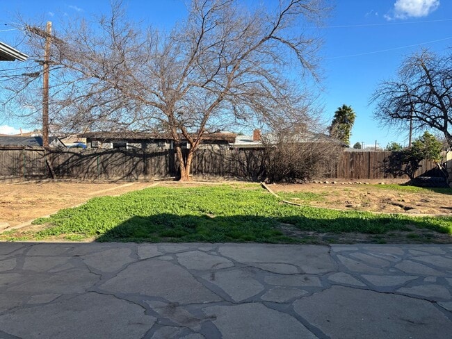 Building Photo - Updated 3 bedroom 2 bathroom home with large backyard, corner lot, close to shopping and schools ...