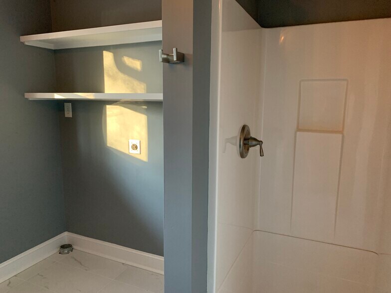 Second bathroom shower and laundry space - 3733 Blandwood Dr