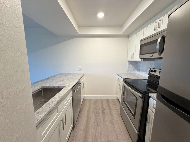 Building Photo - "Charming Clearwater Retreat: Cozy Studio Condo with Scenic Views at Cove Cay!"