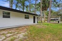 Building Photo - 7133 Pinewood Dr
