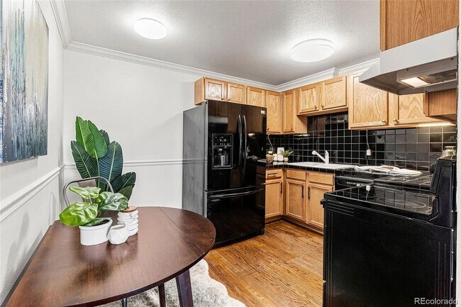 Building Photo - Sunny Corner Condo in the Heart of Capitol Hill | 2 Bed • 2 Bath • 795 Sq. Ft.
