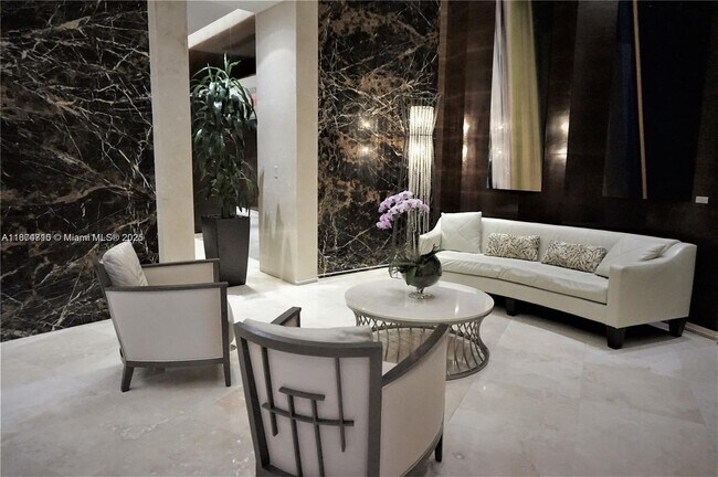 Building Photo - 15811 Collins Ave