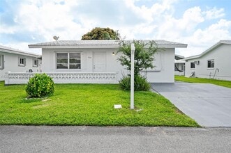 Building Photo - 7004 NW 67th Ave