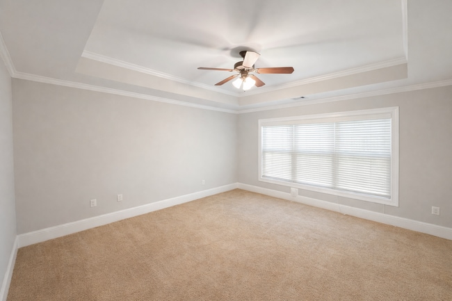 Building Photo - Gated Johns Creek Townhome Offering Space, Privacy, and Everyday Convenience