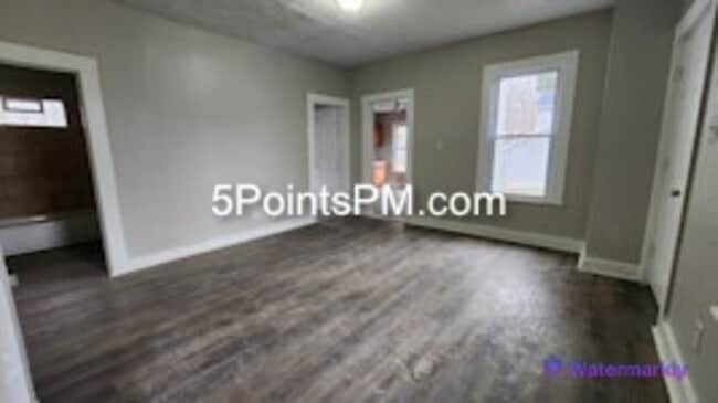 Building Photo - 9804 Miles Ave