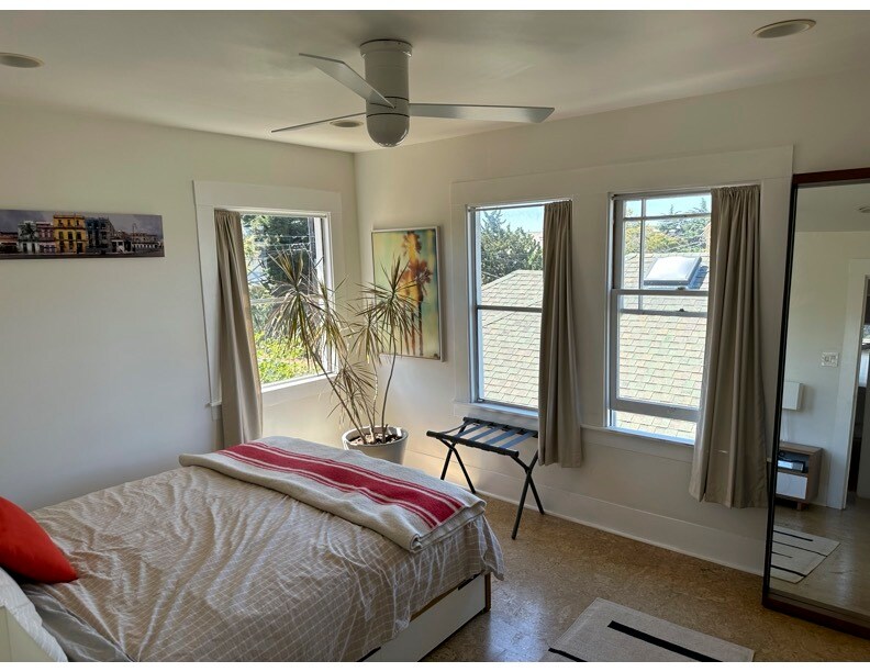Primary Bedroom with Ceiling Fan - 6026 Harwood Ave