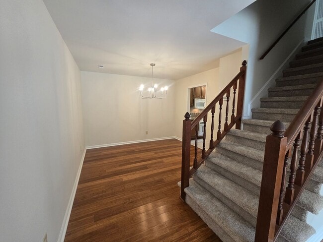 Building Photo - Meticulously Kept 2BR, 3BA Townhome with D...