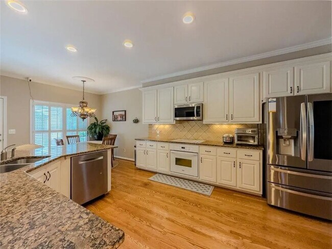 Building Photo - Spacious 6-bedroom house in MILL CREEK cluster in Dacula