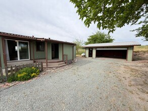 Building Photo - Secluded country home w/ 2-car garage