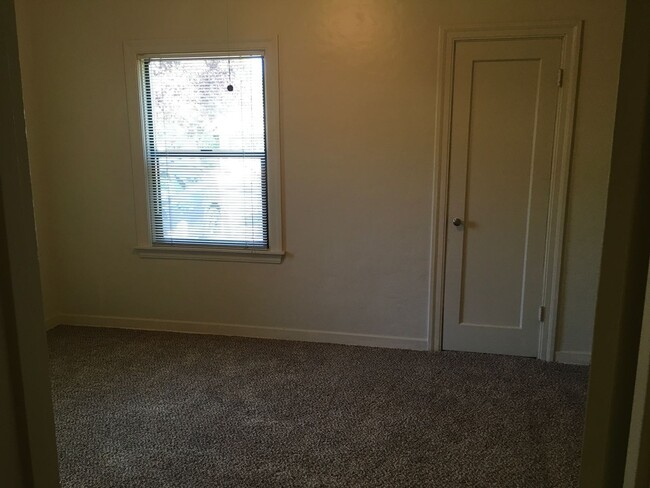 Building Photo - Charming Home, with attached garage