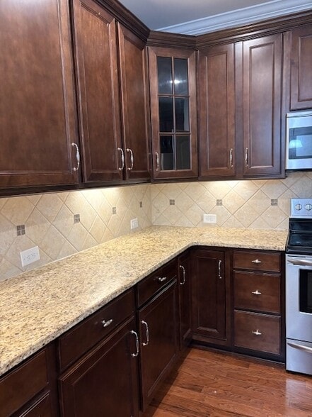 Upgraded counters, backsplash, and cabinets - 108 Bellingdon Dr