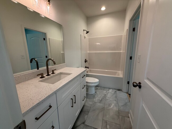 Building Photo - NEW CONSTRUCTION! NOW LEASING FOR AUGUST 2...