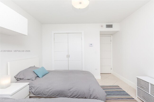 Building Photo - 5555 Collins Ave
